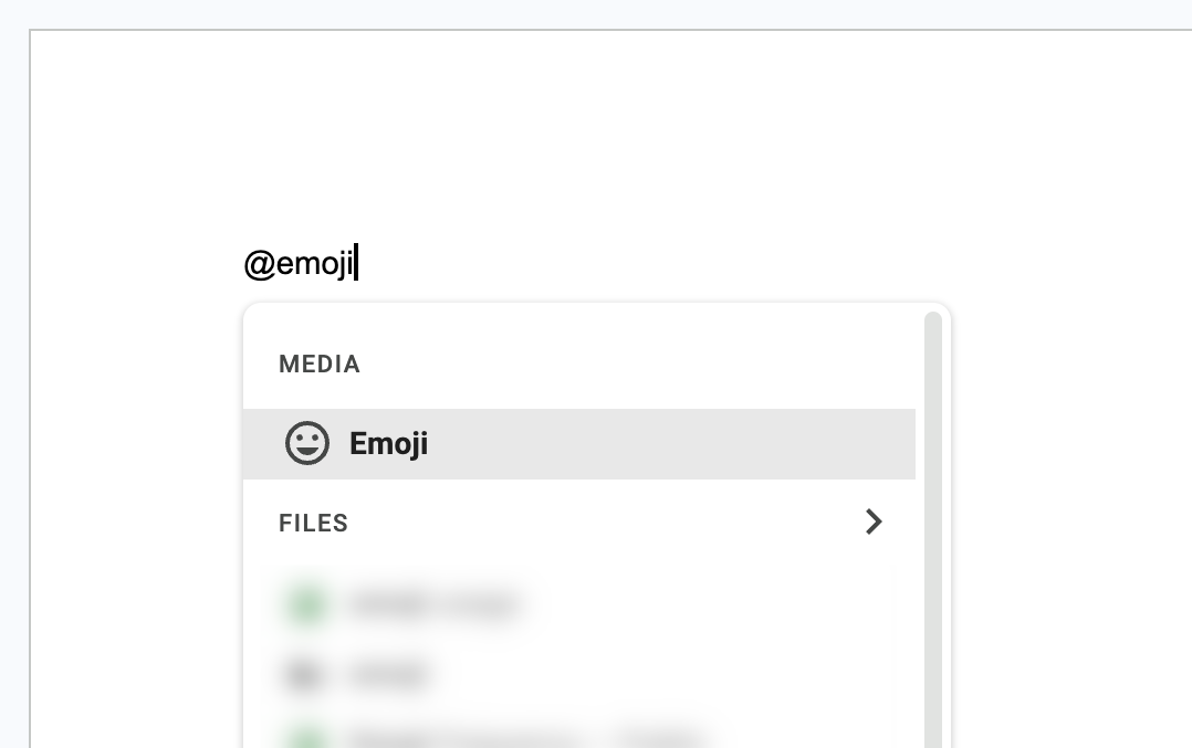 Typing @emoji in a Google Doc opens a menu with Emoji highlighted under Media.